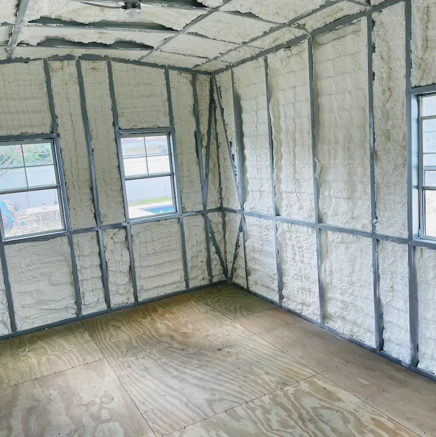Closed-cell spray foam insulation applied to wall cavities in a residential project in Spanish Springs